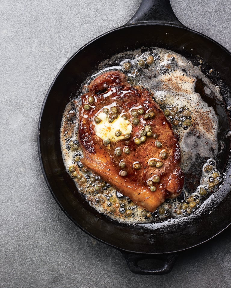 Steak with anchovy and caper butter