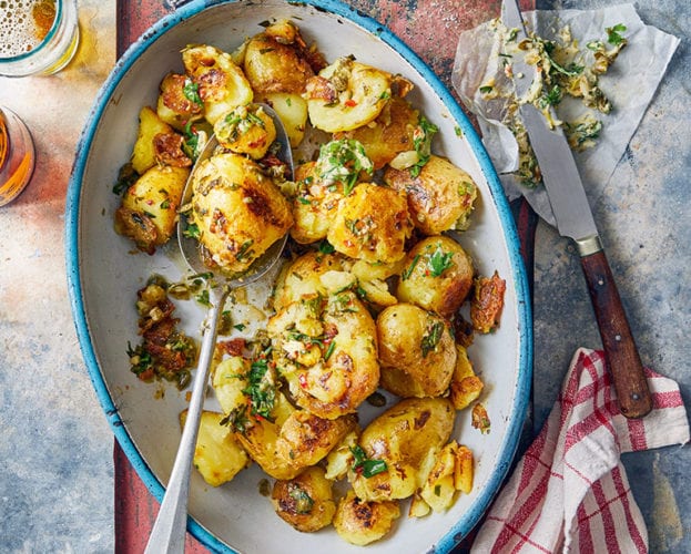 Charred baby potatoes with chilli butter