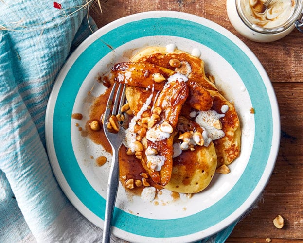 Caramel banana pancakes with salted peanuts