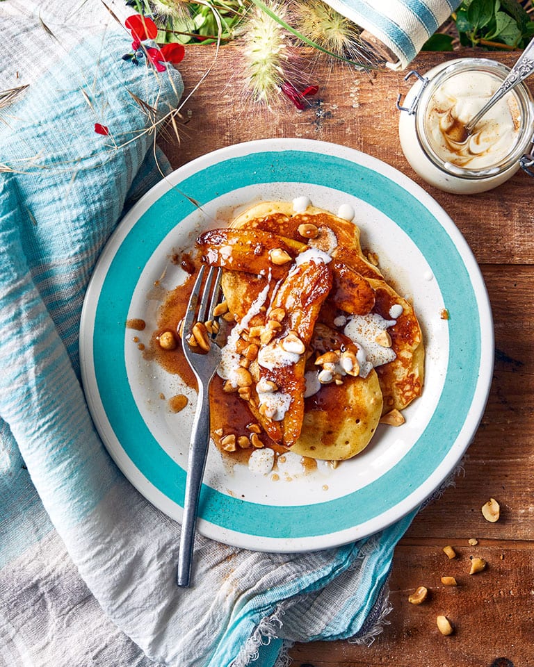 Caramel banana pancakes with salted peanuts