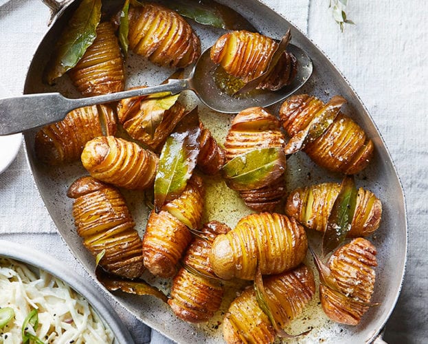 Roast hasselback potatoes with bay and brandy butter