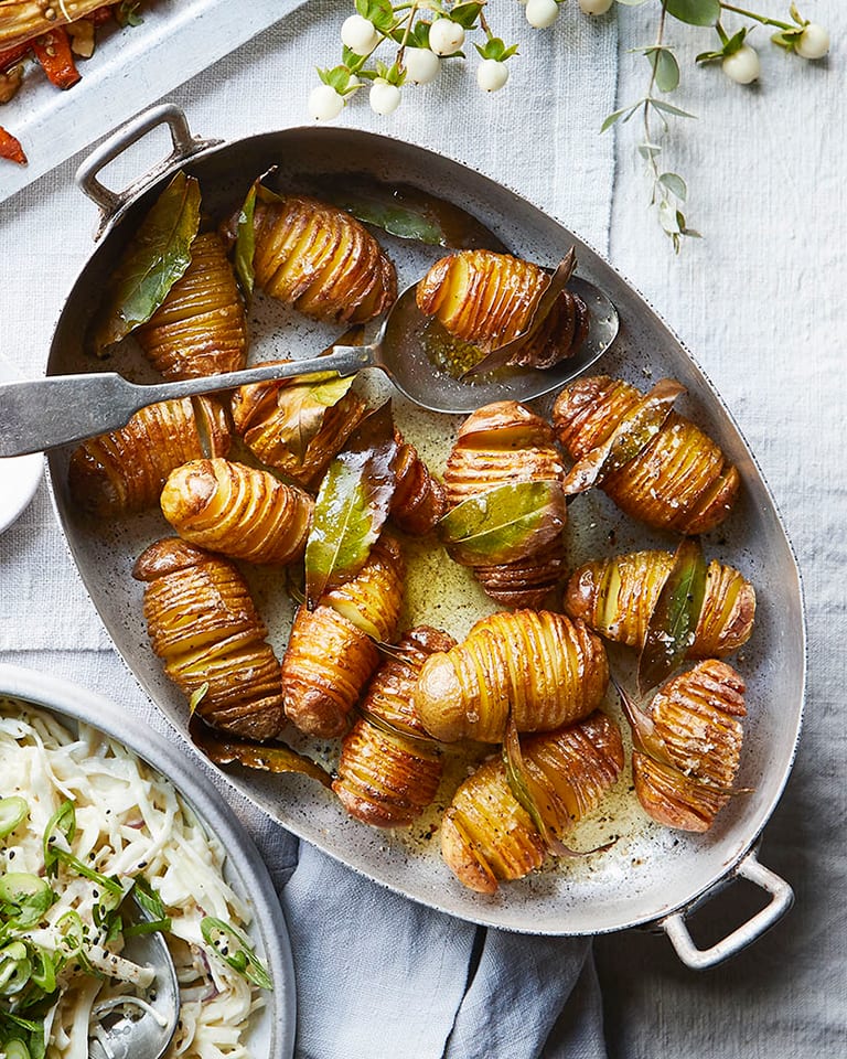 Roast hasselback potatoes with bay and brandy butter