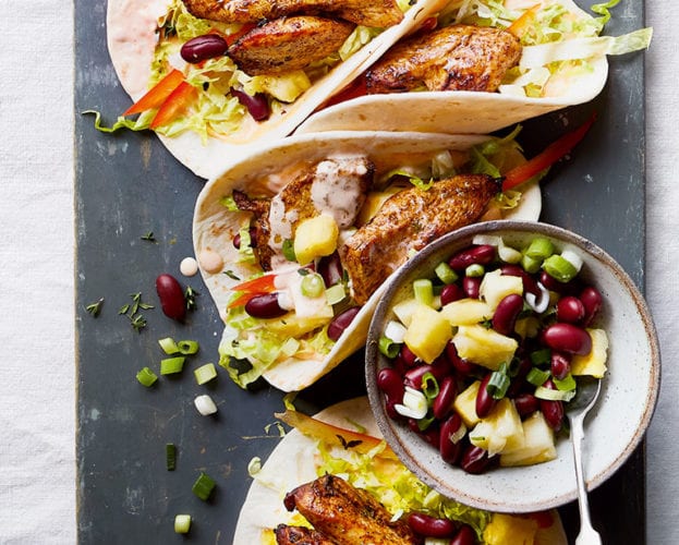 Jerk chicken wraps with bean salsa and spicy mayo