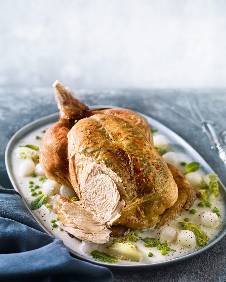 Wild garlic, tarragon and mint roast chicken with lettuce and peas