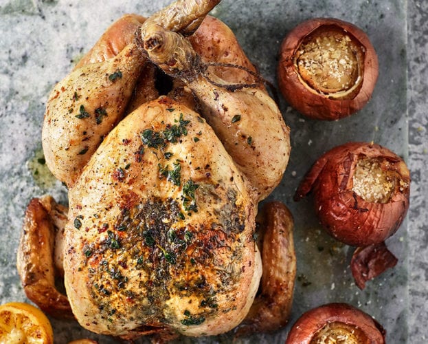 Lemon thyme roast chicken and bread sauce stuffed onions