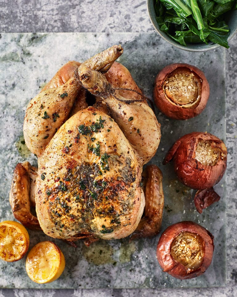 Lemon thyme roast chicken and bread sauce stuffed onions