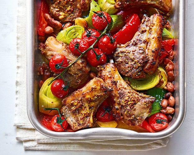 Lamb tray roast with mustard, leek and tomatoes