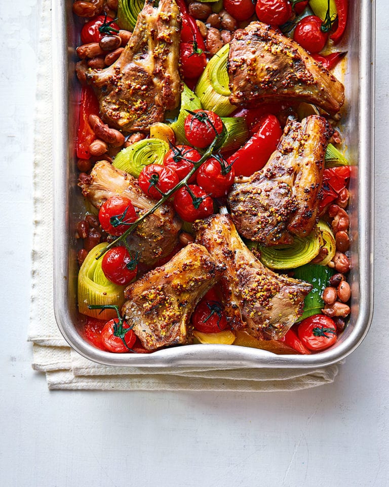 Lamb tray roast with mustard, leek and tomatoes