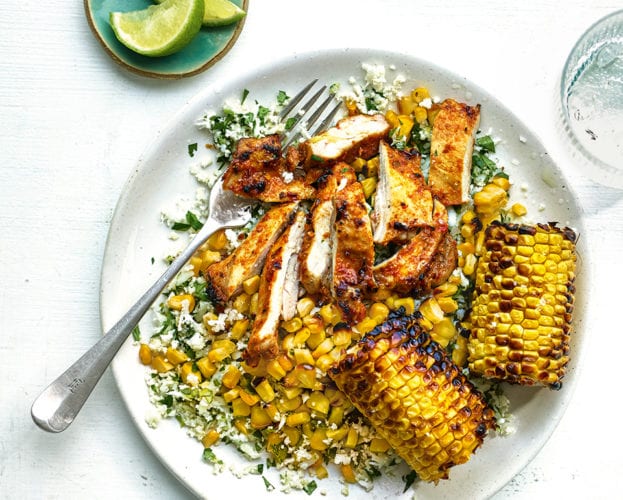 Peri-peri spiced chicken with cauliflower rice and charred corn cobs