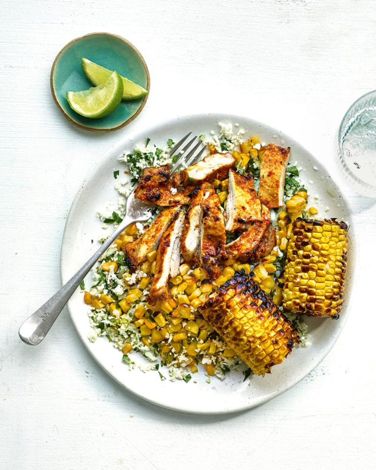 Peri-peri spiced chicken with cauliflower rice and charred corn cobs