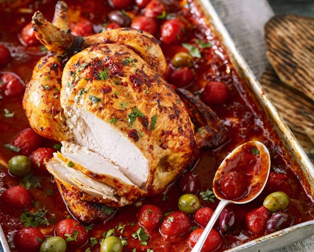 Harissa roast chicken with flatbreads and preserved lemon yogurt
