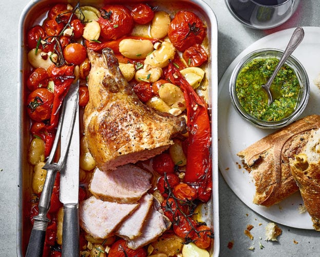 Ibérico pork loin with sherry roasted tomatoes, peppers and butter beans