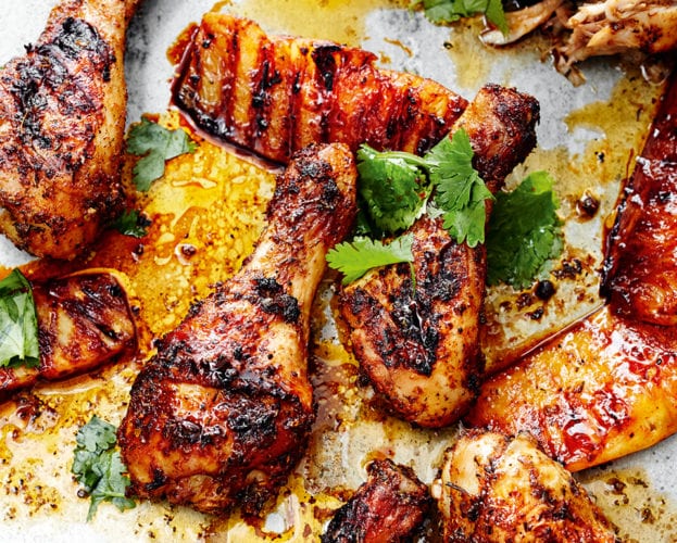 Cajun chicken drumsticks with charred pineapple wedges