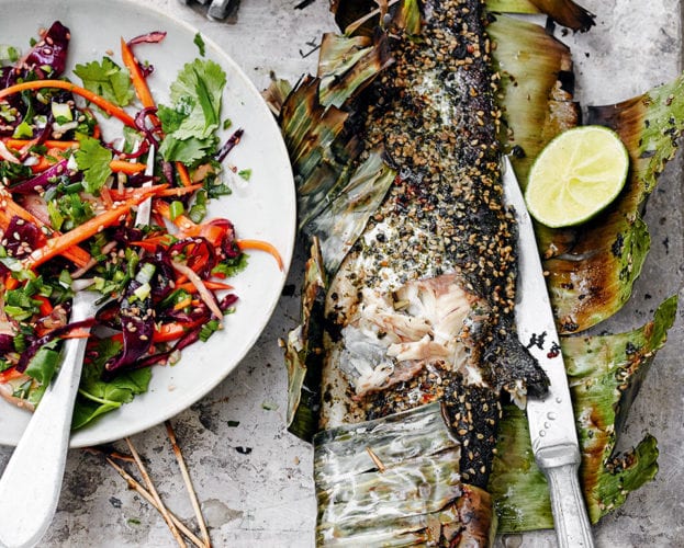 Trout grilled in banana leaf with Asian-style slaw