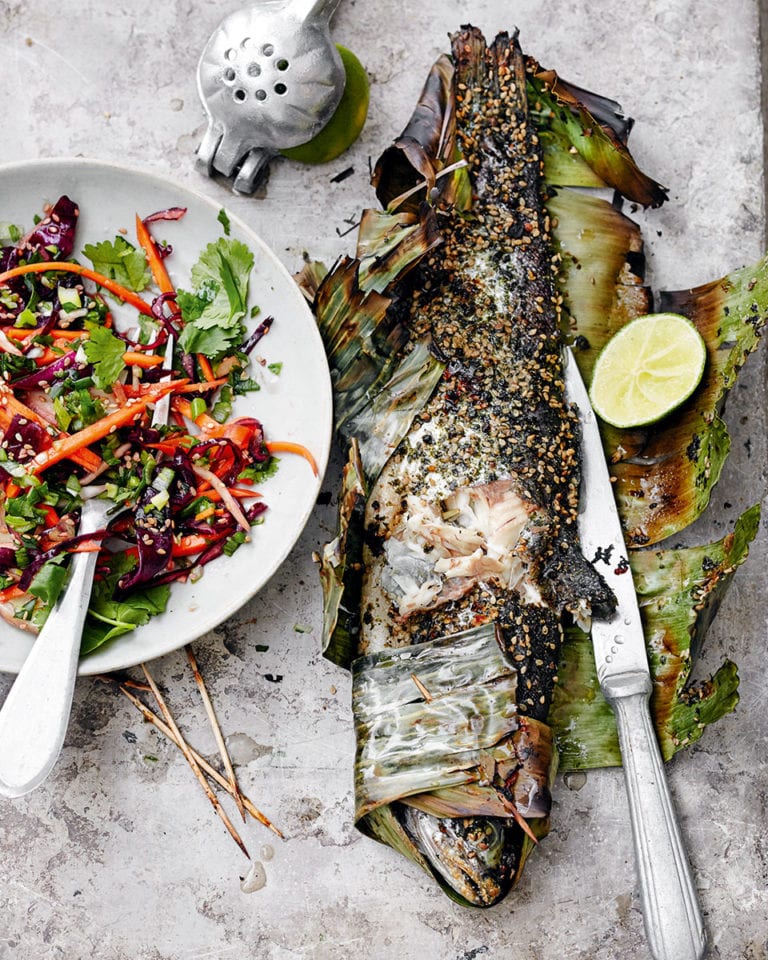 Trout grilled in banana leaf with Asian-style slaw