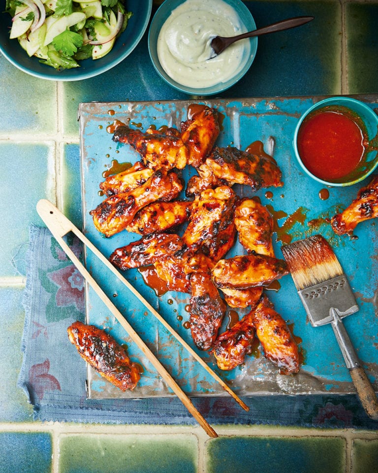 Sticky buffalo wings with blue cheese sauce