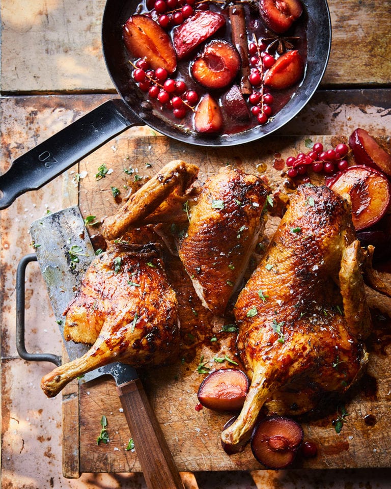 Spatchcock duck with plums and redcurrants