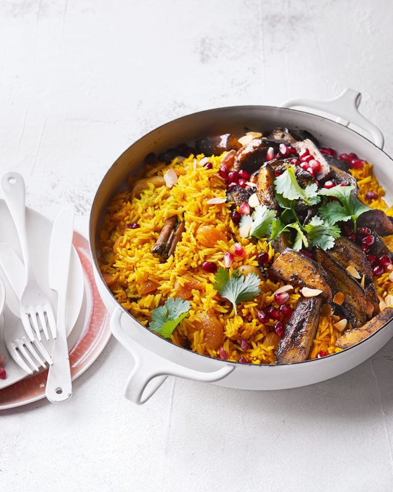 Aubergine pilaf with apricots and almonds