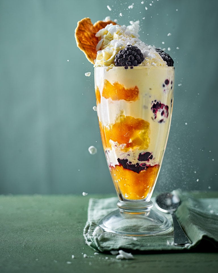 Peach and blackberry knickerbocker glory