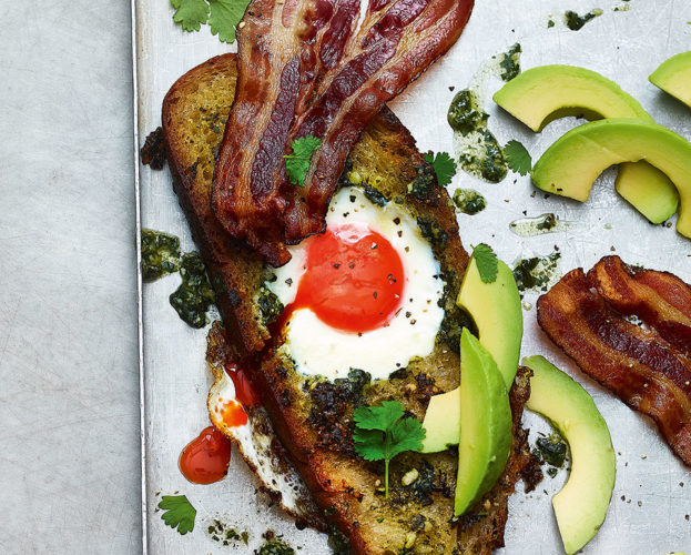 Pesto eggs with sourdough, avocado and bacon