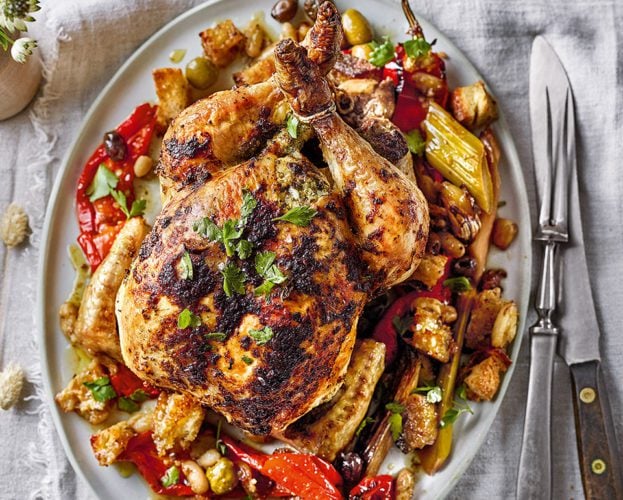 Roast chicken with leeks, peppers and olives