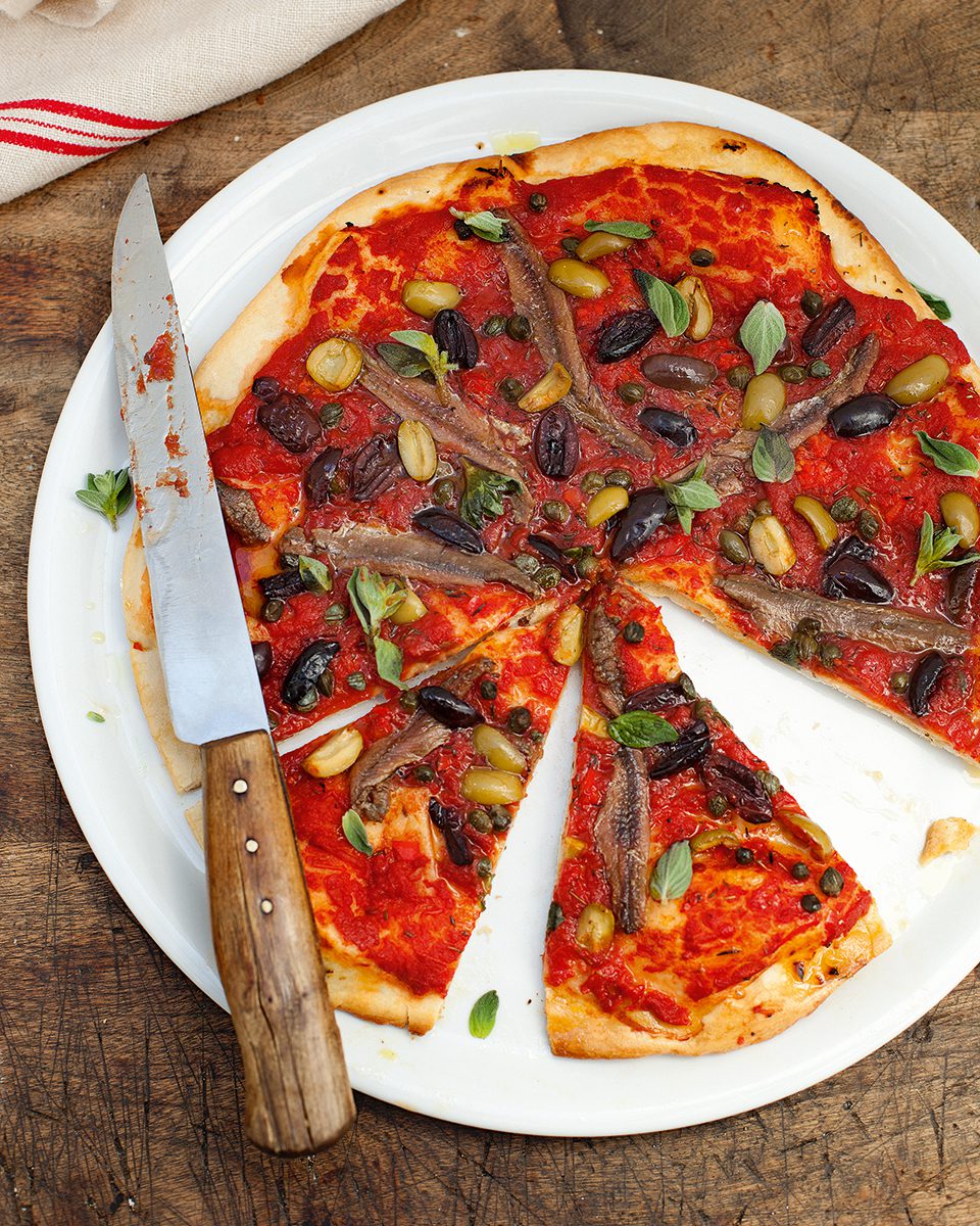 Anchovy and olive pizza recipe | delicious. magazine