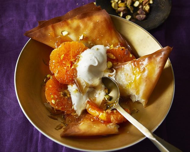 Sweet filo triangles with cardamom, clementine and pistachios