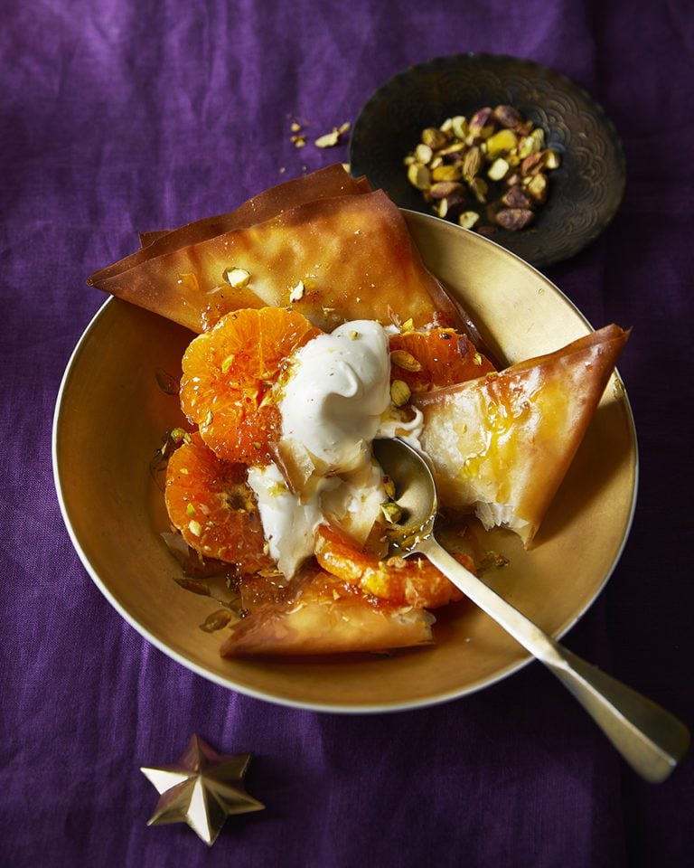 Sweet filo triangles with cardamom, clementine and pistachios