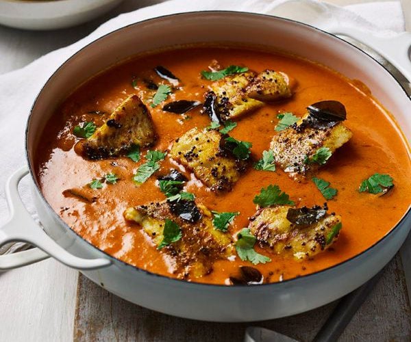 Rich coconut and tomato fish curry