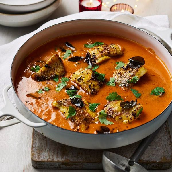Rich coconut and tomato fish curry