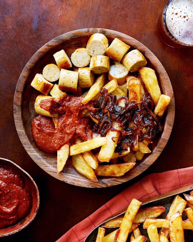 Currywurst with sticky-onion oven fries