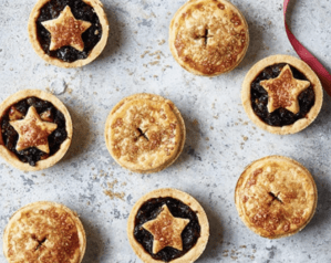 Star-topped mince pies shown on marble