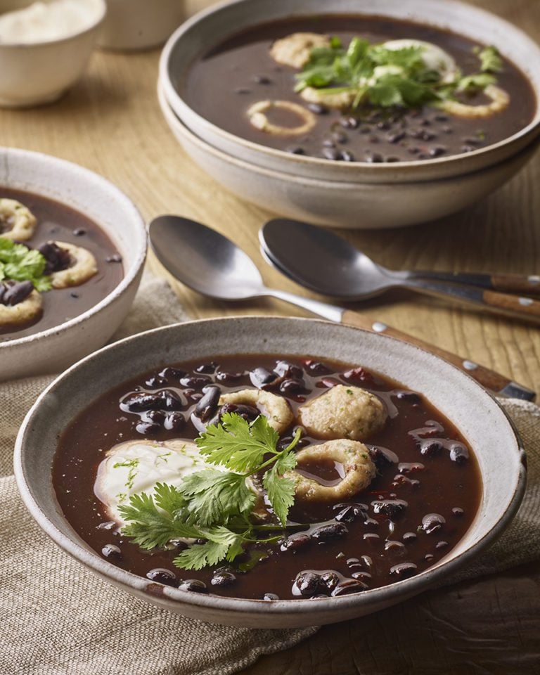 Black bean chilli soup with corn dumplings
