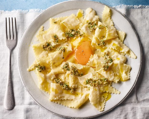 Lasagne sheets with celeriac sauce, olive tapenade and egg yolk