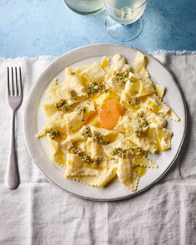 Lasagne sheets with celeriac sauce, olive tapenade and egg yolk