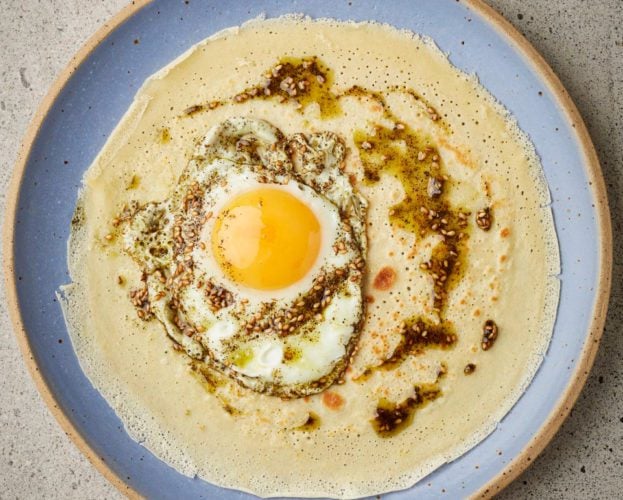 Pancakes with fried eggs