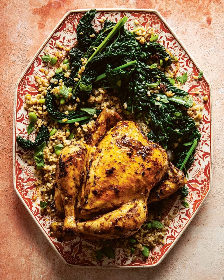 Pressure cooker pot-roast chicken with freekeh and greens