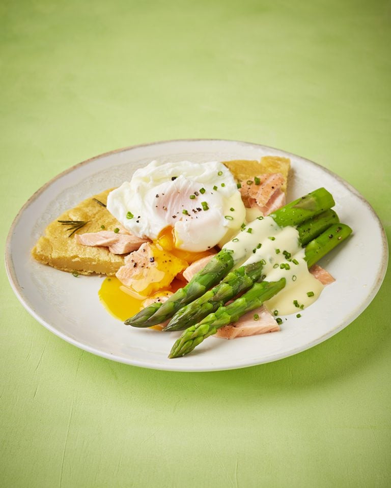 Asparagus farinata with trout, poached egg and hollandaise