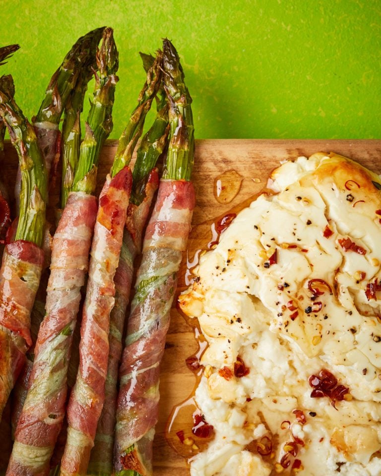 Pancetta-wrapped asparagus with baked feta and honey