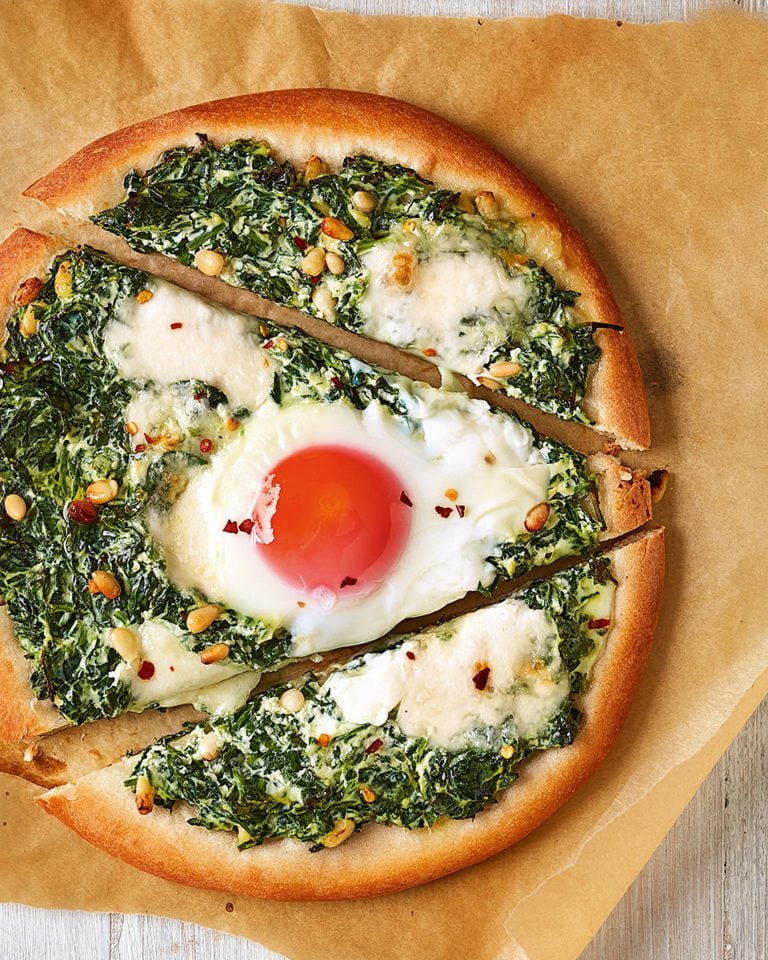 Spinach, ricotta and egg pizzas