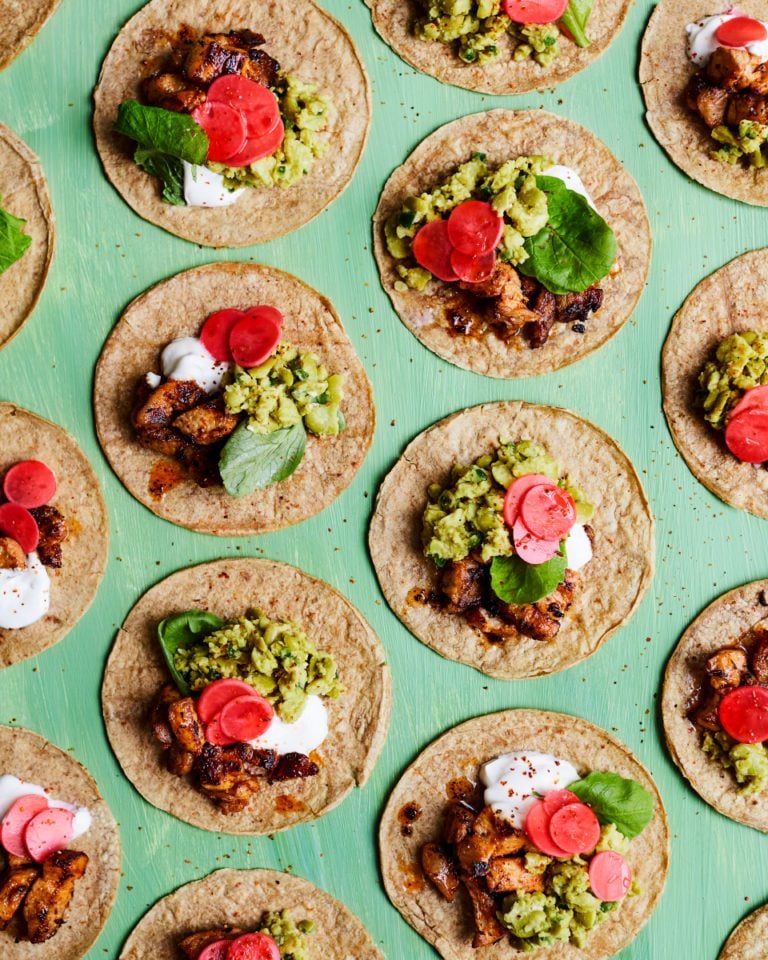 Pork belly tacos with smashed broad beans