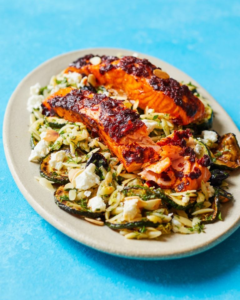 Harissa salmon with orzo courgette salad