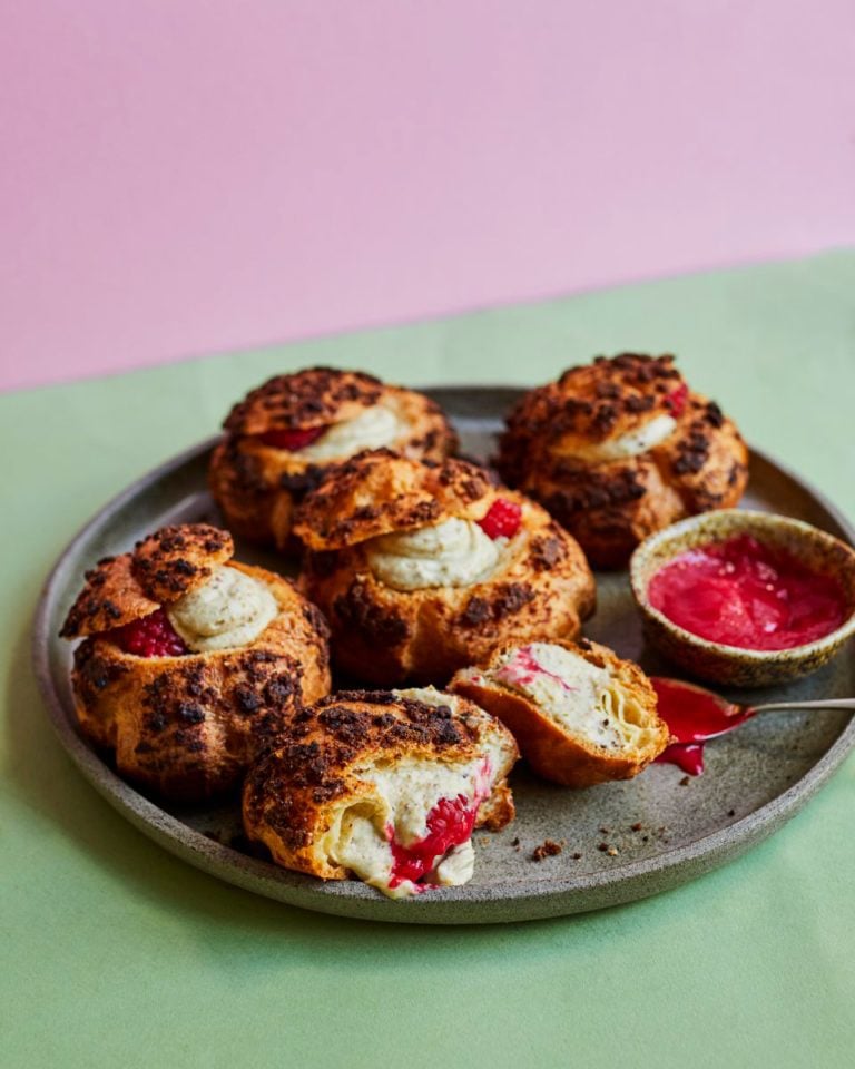 Choux buns with raspberry, rose and pistachio