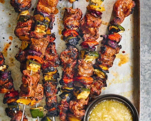Sticky jerk lamb skewers with garlic sauce