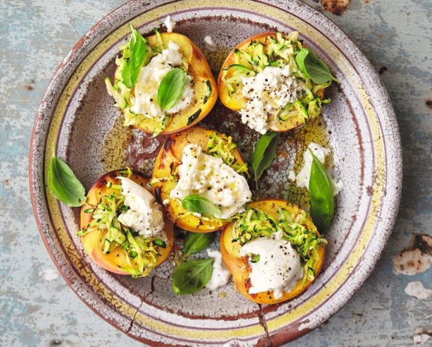 Grilled peaches with burrata, basil and courgette shavings