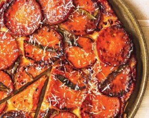 Squash tarte tatin shown in a round dish