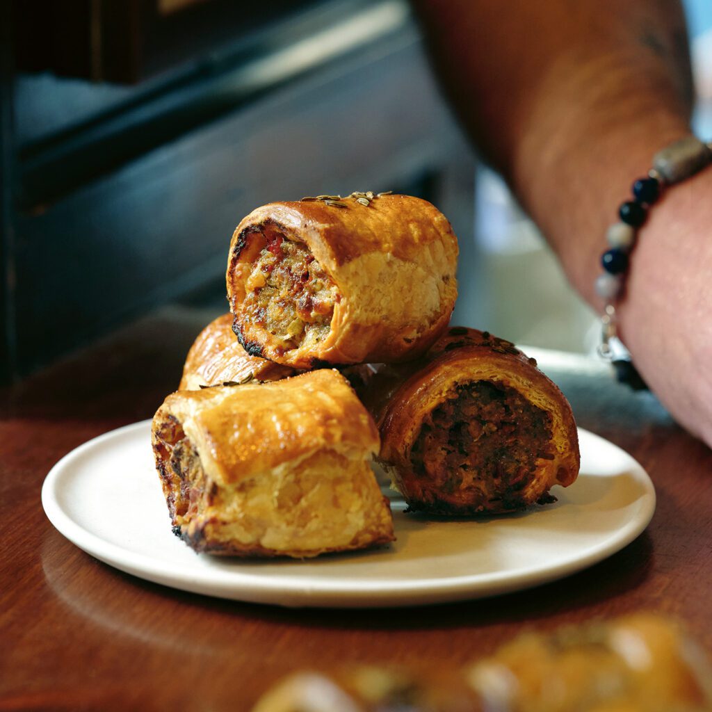 A plate of sausage rolls