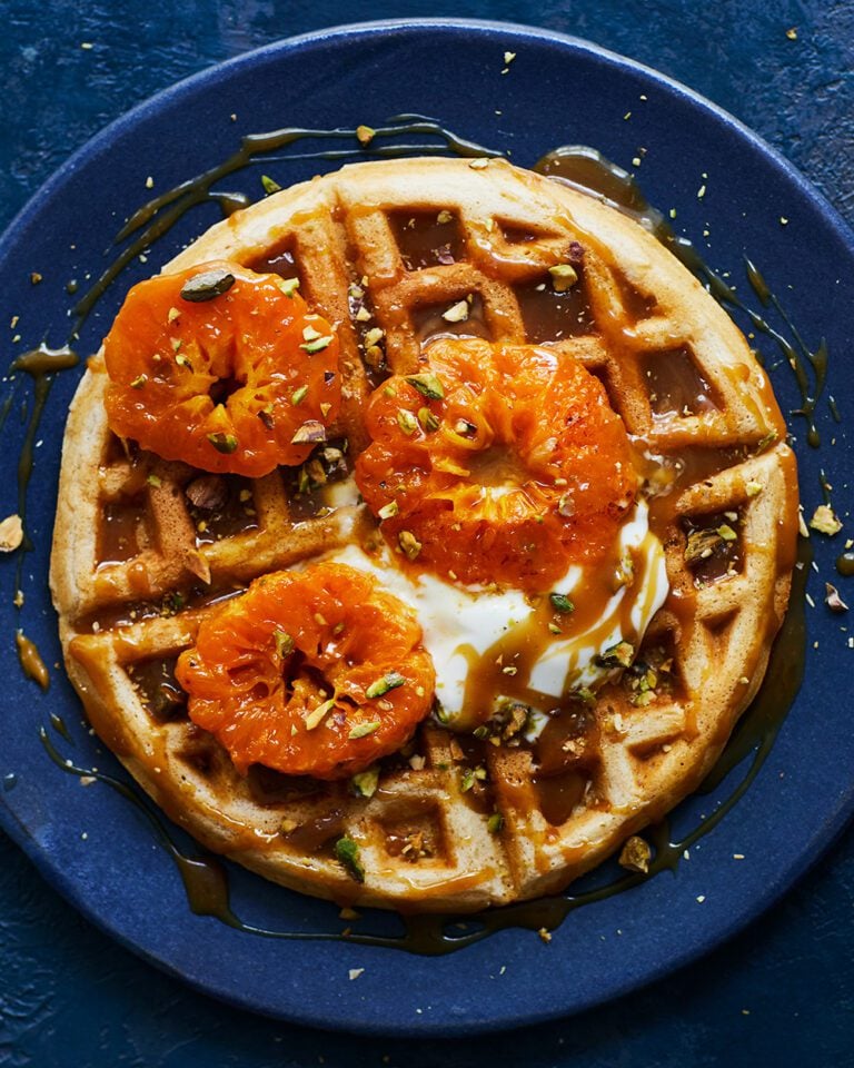 Waffles with caramelised clementines and pistachios