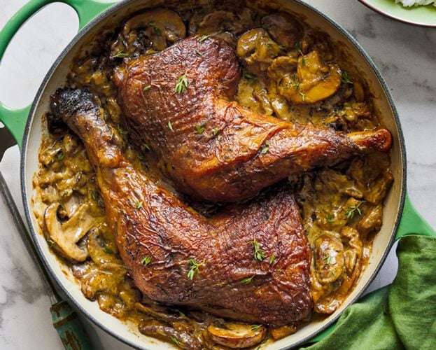 Braised turkey legs in a casserole dish