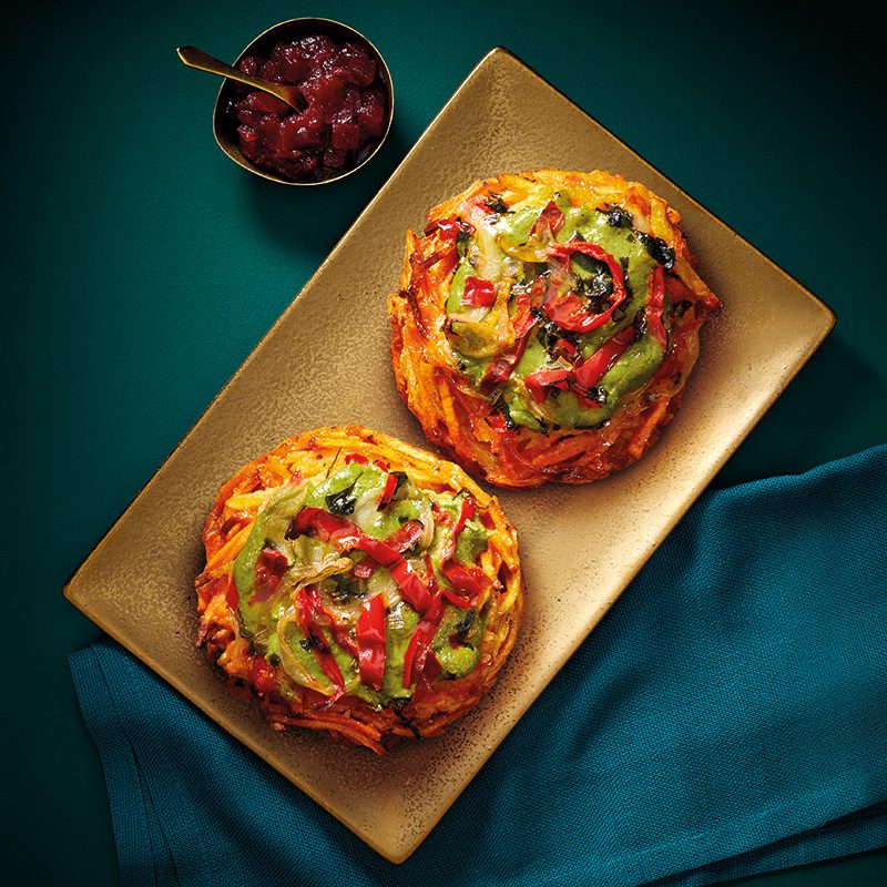 Two vegetable rostis on a platter